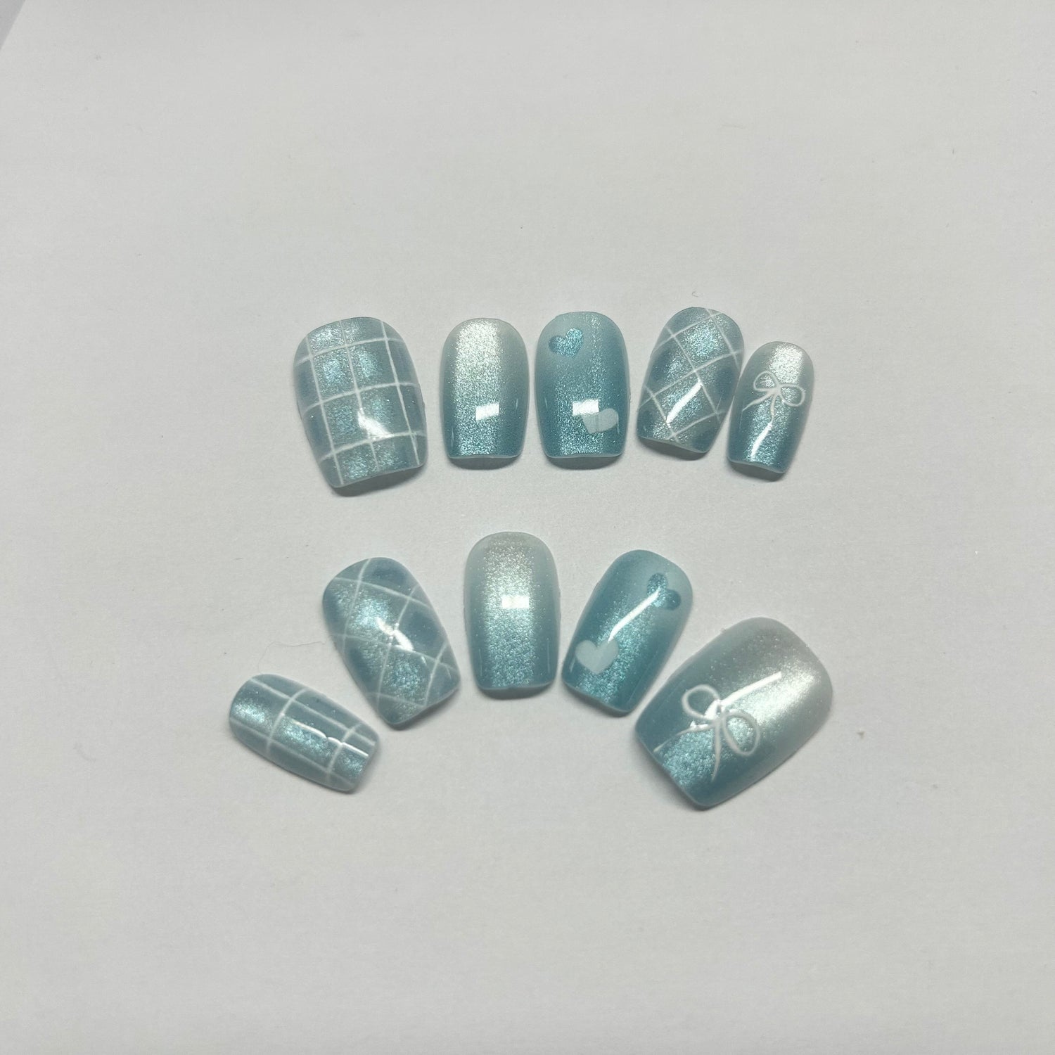 Light Blue Cat Eye with White Heart